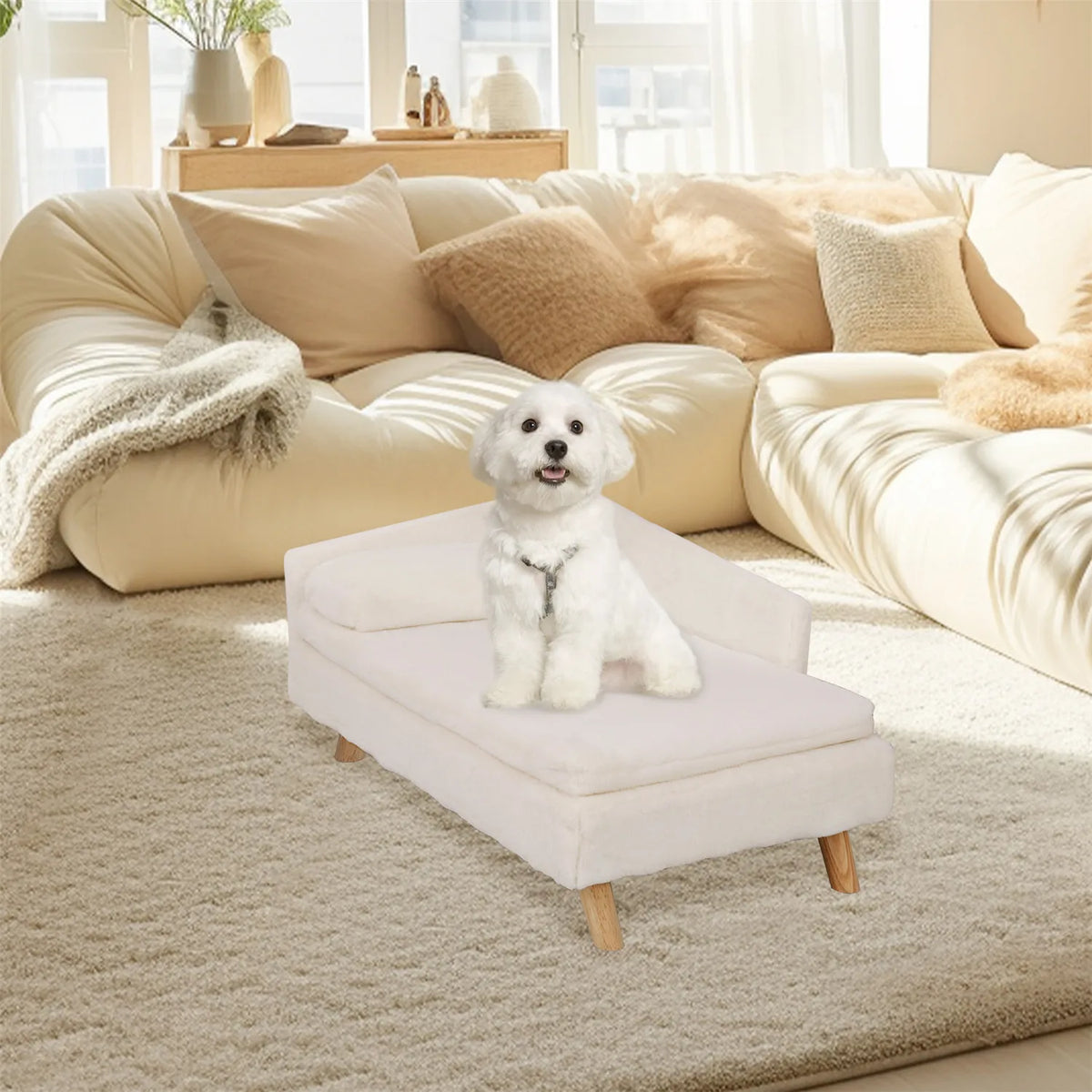 Cream elevated dog bed with wooden legs and padded sofa-style design in a living room